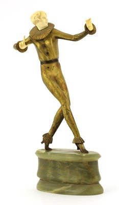 Lot 254 - An Art Deco cold-painted bronze and ivory figure of an harlequin