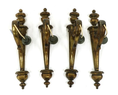 Lot 200 - A set of four Edwardian bronze wall lights