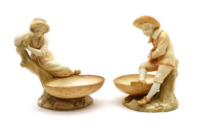 Lot 94 - A pair of Royal Worcester Hadley blush ivory porcelain figural comports