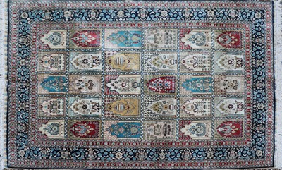 Lot 259 - A hand knotted silk Hereke rug