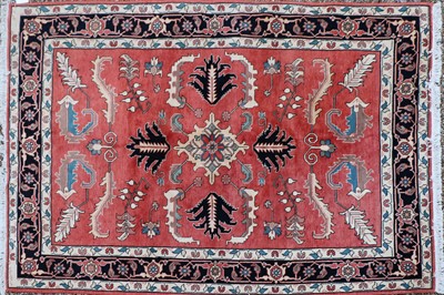 Lot 248 - A hand knotted Heriz carpet