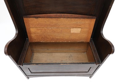 Lot 142 - An Arts and Crafts oak settle