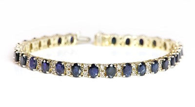 Lot 360 - A Continental sapphire and diamond line bracelet