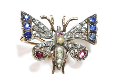 Lot 103 - A split pearl, sapphire, ruby and diamond, butterfly brooch, c.1900