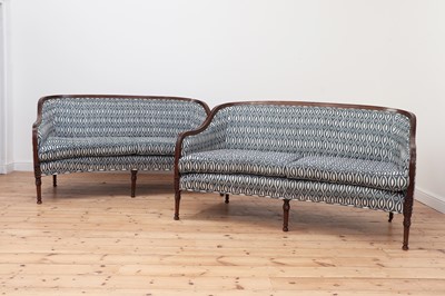 Lot 589 - A pair of George III-style mahogany-framed sofas