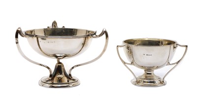 Lot 54 - An arts and crafts three handled silver bowl
