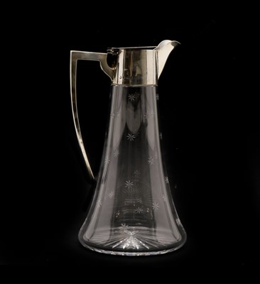 Lot 2 - An Edwardian silver mounted and cut glass claret jug