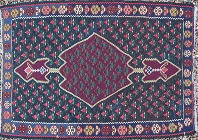 Lot 387 - A Sine Kilim rug