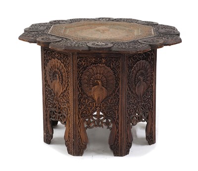 Lot 525 - An octagonal table with folding base