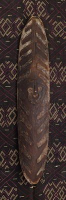 Lot 703 - A Sepik River carved tiki board