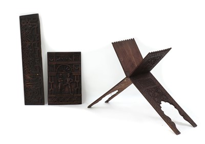 Lot 520 - A relief carved wooden panel