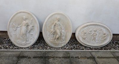 Lot 535 - A pair of composite stone oval panels