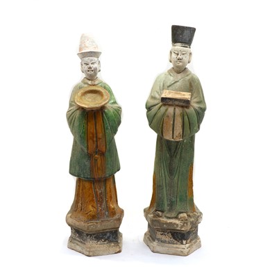 Lot 301 - A pair of Tang or Ming Dynasty style sancai-glazed pottery tomb figures