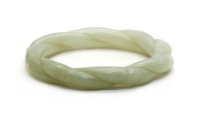 Lot 114A - A Chinese jade bangle