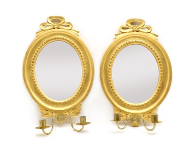 Lot 196 - A pair of Continental gilt framed mirrored Girandoles