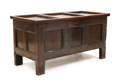 Lot 352 - An oak three panel coffer