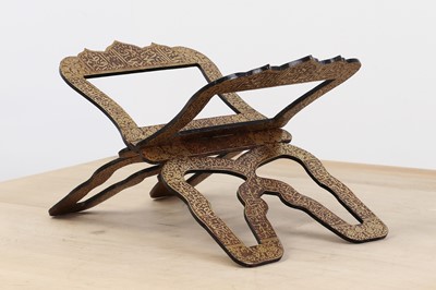 Lot 553 - A steel and gold koftgari Qur'an stand