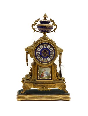 Lot 216 - A 19th century French gilt cased mantle clock