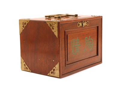 Lot 119 - A cased mahogany mahjong set