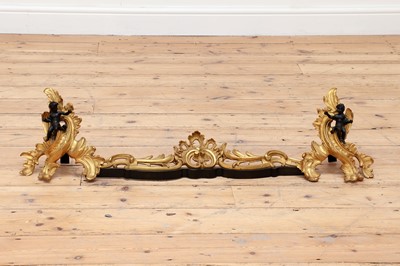Lot 768 - A pair of rococo revival gilt ormolu chenets