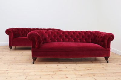 Lot 559 - A matched pair of Victorian chesterfield sofas