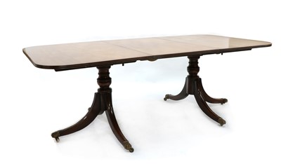 Lot 411 - A George III-style mahogany dining table