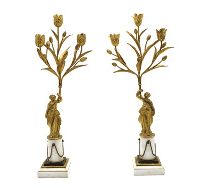 Lot 134 - A pair of gilt-bronze three branch candelabra