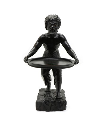 Lot 149 - A carved and ebonsied Blackamoor card tray