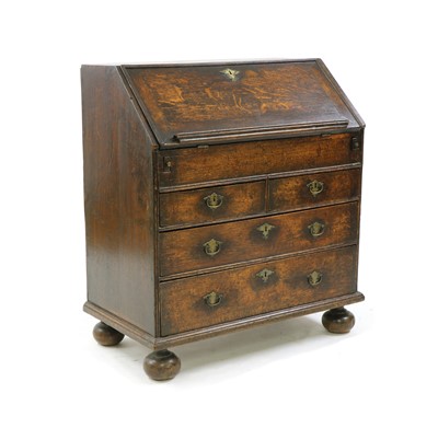 Lot 331 - A George I/II provincial oak bureau