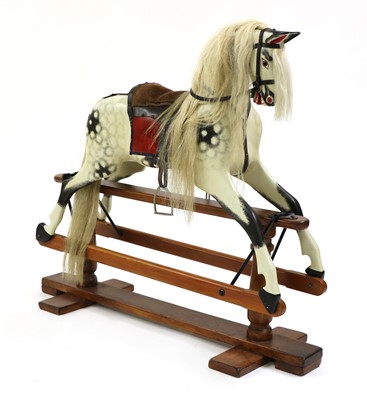 Lot 320 - A painted pine rocking horse