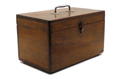 Lot 228 - An oak case or toolbox containing woodworking chisels