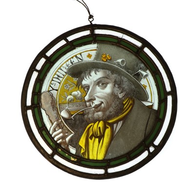 Lot 104A - A stained and leaded glass roundel
