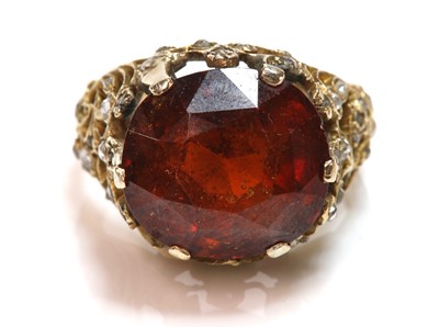 Lot 208 - A single stone hessonite garnet ring