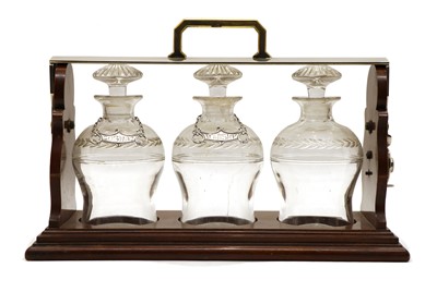 Lot 96 - A Betjeman's Patent three decanter tantalus