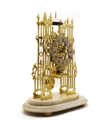Lot 218 - A brass cathedral skeleton clock