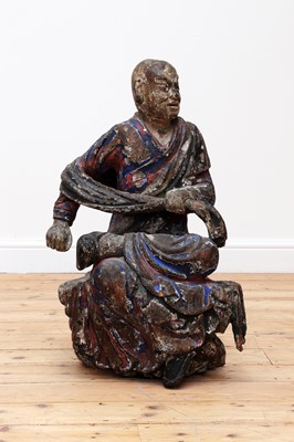 Lot 701 - A carved wooden and polychrome-decorated Luohan
