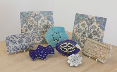 Lot 523 - A pair of Iznik pottery tiles