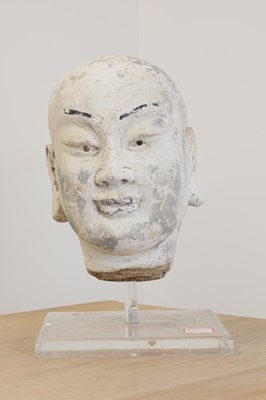 Lot 198 - A large Ming-style stucco and polychrome-decorated head of Luohan