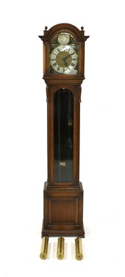 Lot 337 - An oak longcase clock