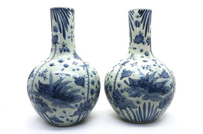 Lot 176 - A pair of Chinese blue and white vases