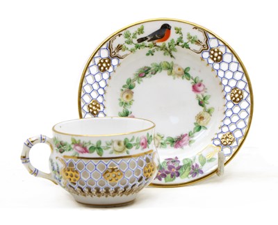 Lot 61 - A Kerr & Binns Worcester reticulated porcelain cup and saucer