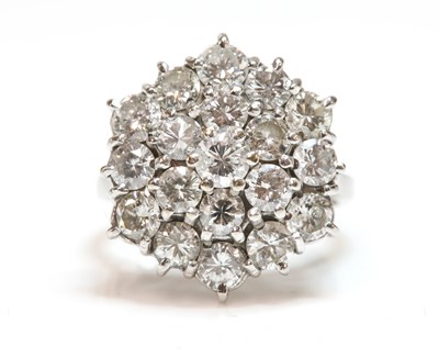 Lot 445 - A three tier diamond hexagonal cluster ring