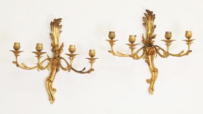 Lot 63 - A pair of ormolu rococo wall lights