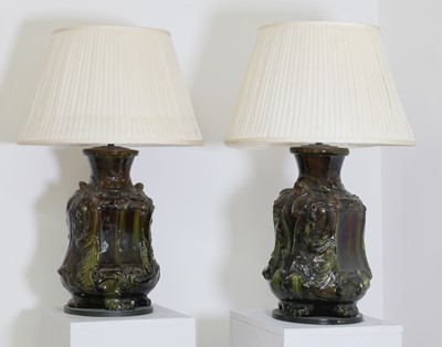 Lot 144 - A pair of green-glazed faience apothecary vases