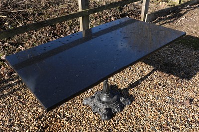 Lot 443 - A granite topped garden or kitchen table
