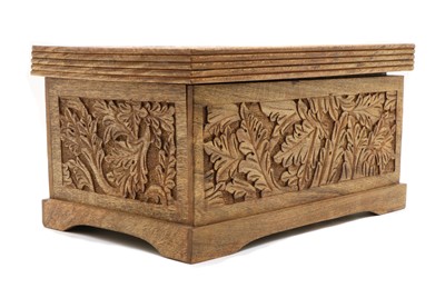Lot 234 - A carved walnut chest
