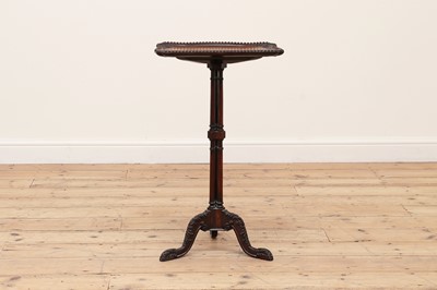 Lot 586 - A rosewood tripod table