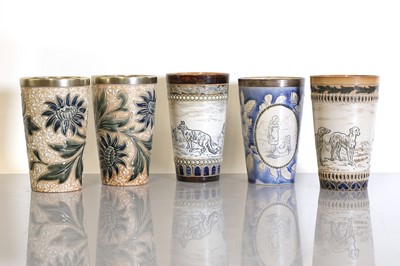 Lot 1 - A pair of Doulton Lambeth stoneware beakers