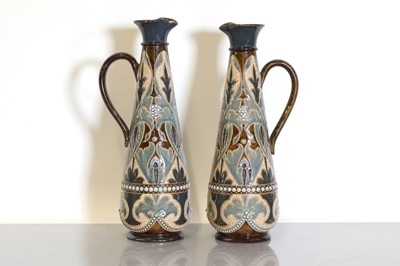 Lot 7 - A pair of Doulton Lambeth stoneware ewers