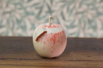 Lot 428 - A carved and stained ivory okimono